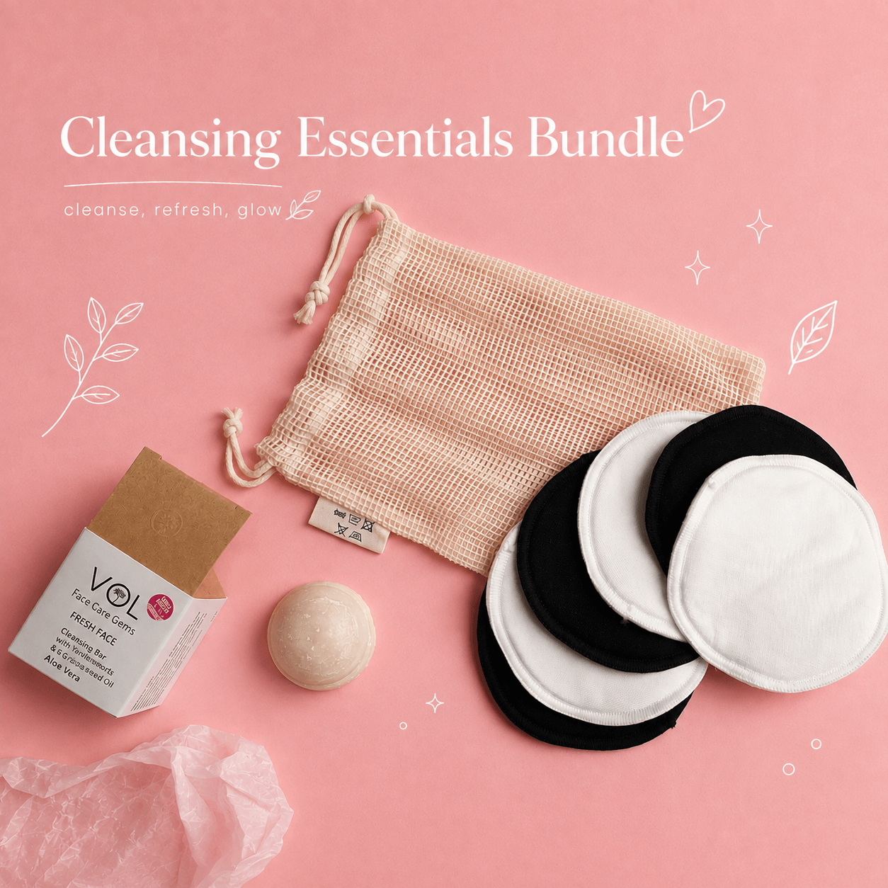 Minimal flat lay του Cleansing Essentials Bundle με reusable δίσκους ντεμακιγιάζ, cleansing bar και eco-friendly βαμβακερό pouch